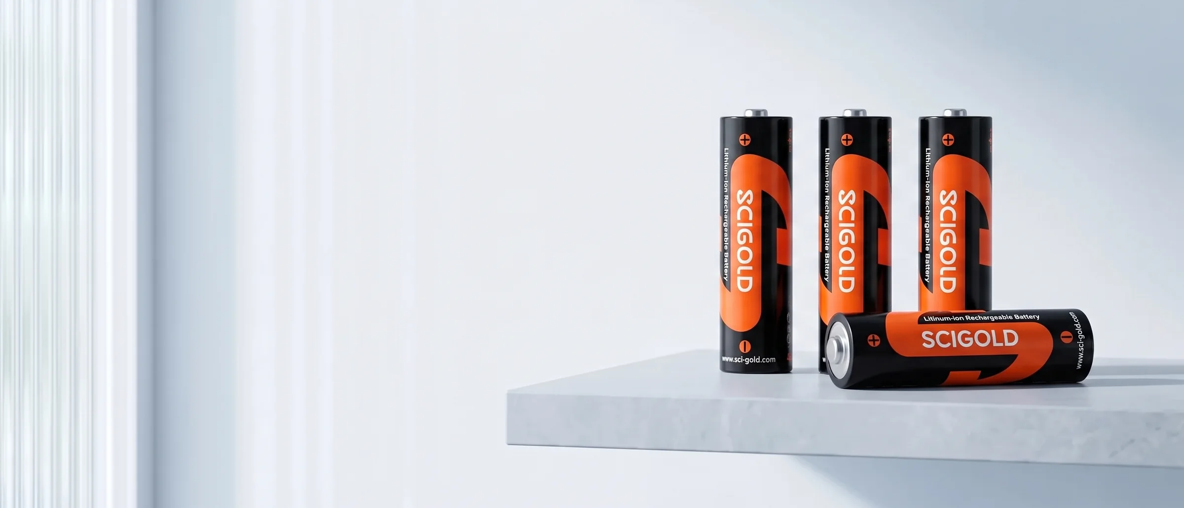 Four SCIGOLD AA 1.5V Li-ion cells on a stone shelf