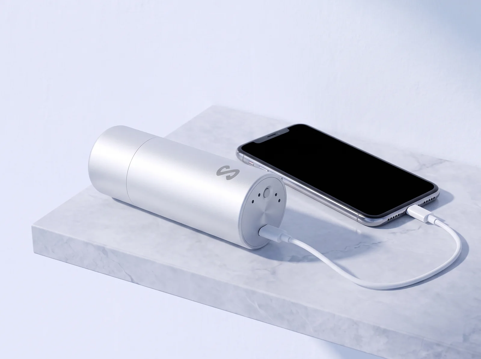 The SCIGOLD lightstick battery charging a phone over USB-C